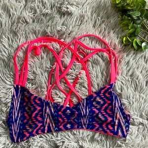 NWOT khong boon pink and blue tribal pattern bikini top size S.